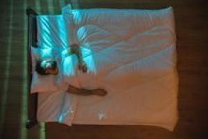 man-sleeping-in-bed-big-spotlight-size
