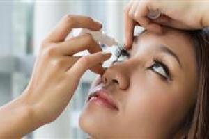 woman-putting-in-eye-drops-new-spotlight-size