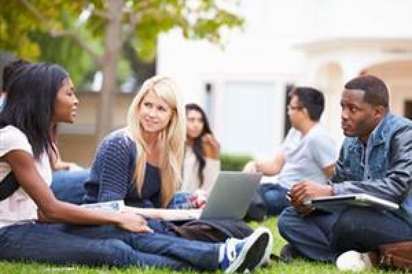 college-students-on-lawn-spotlight
